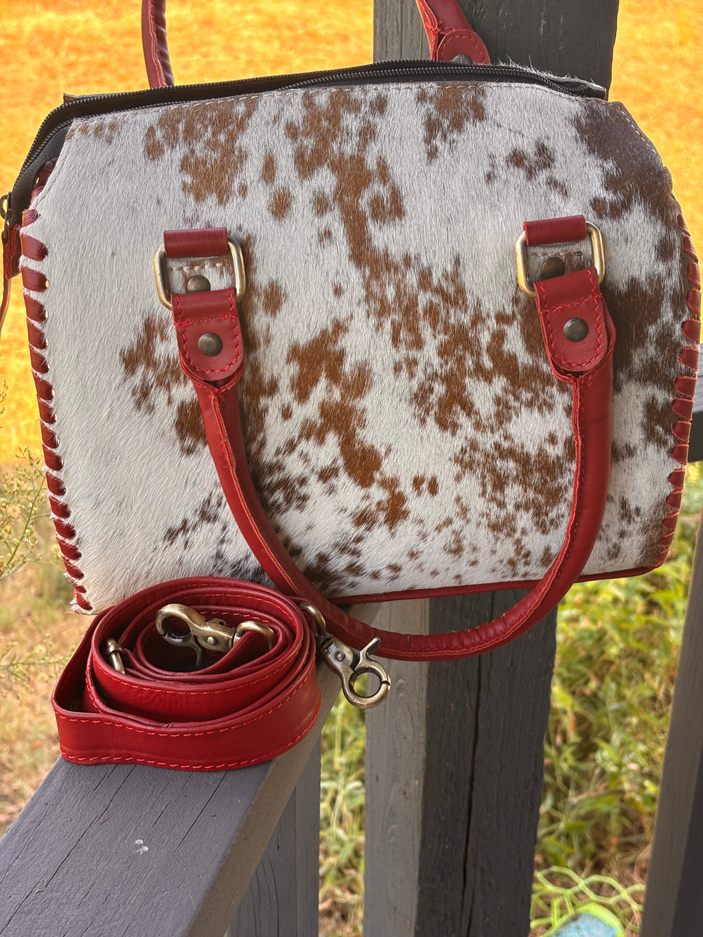 Medium 11” hair on hide speedy with Red Leather