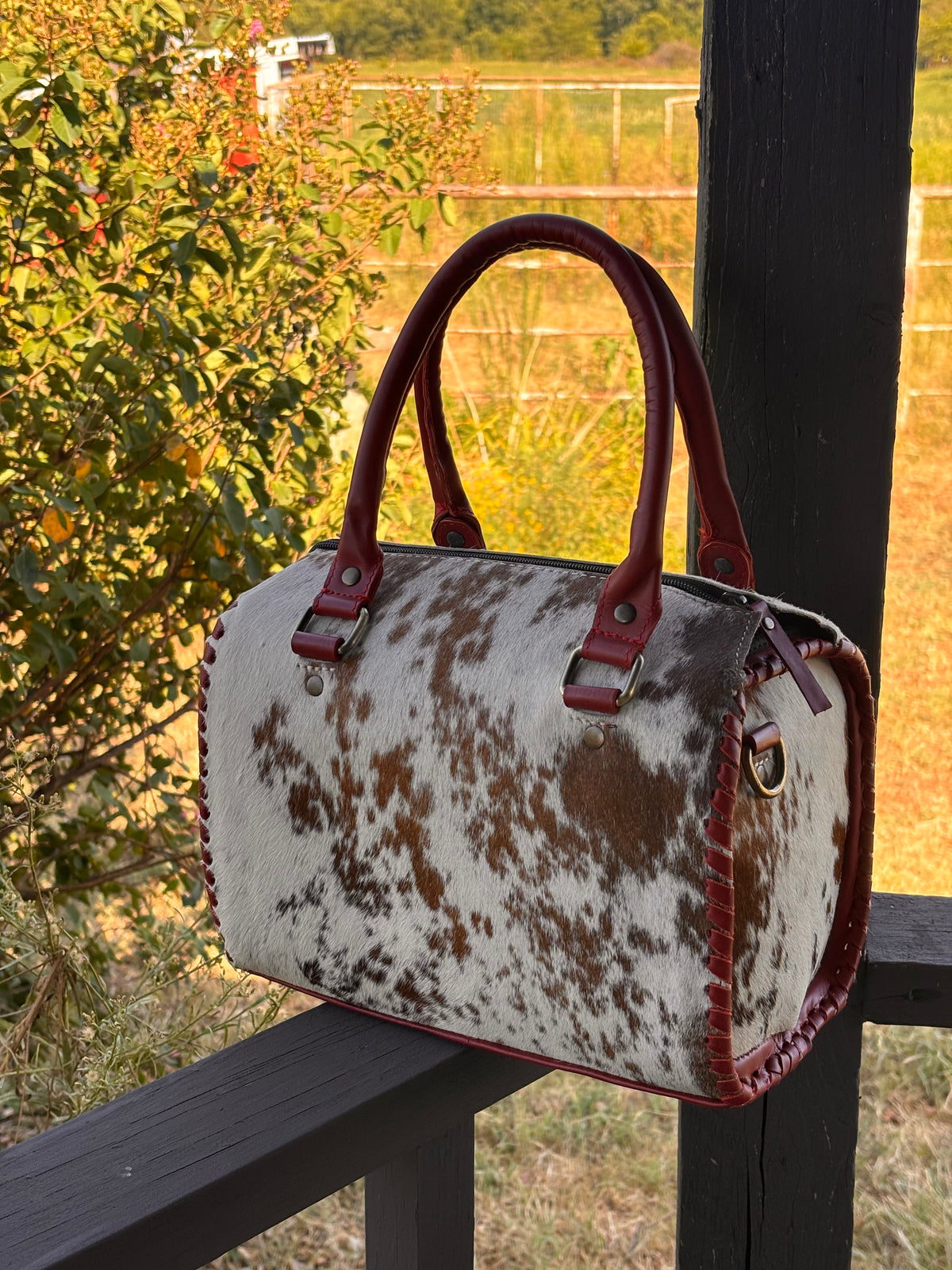 Medium 11” hair on hide speedy with Red Leather