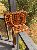 Checkered leather hand bag with matching wallet