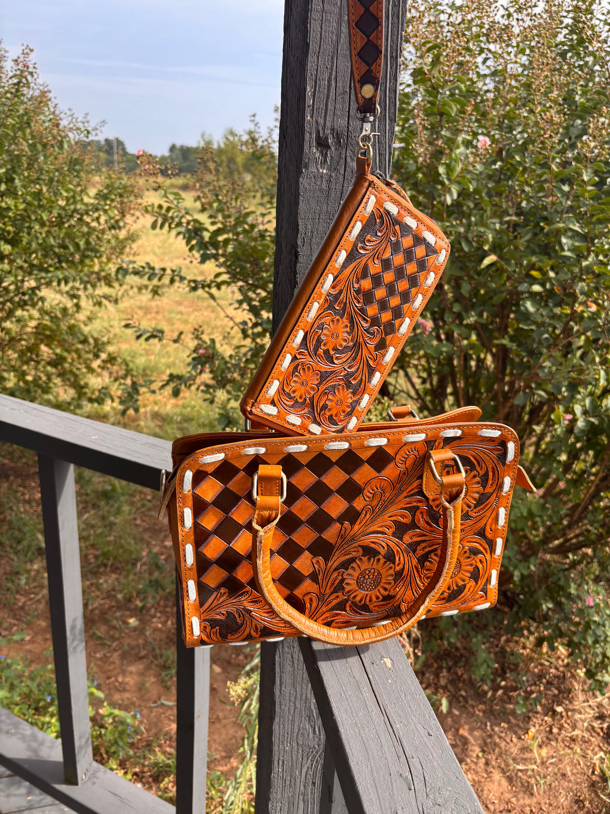 Checkered leather hand bag with matching wallet
