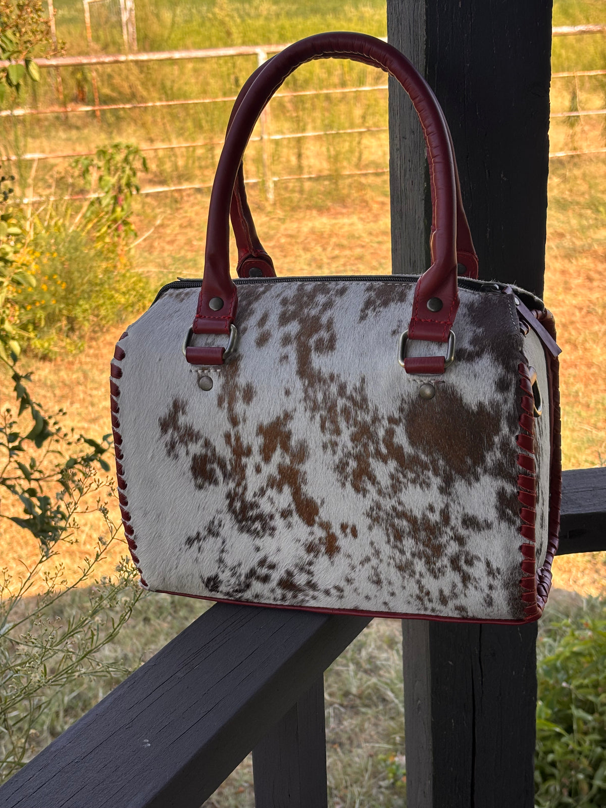 Medium 11” hair on hide speedy with Red Leather