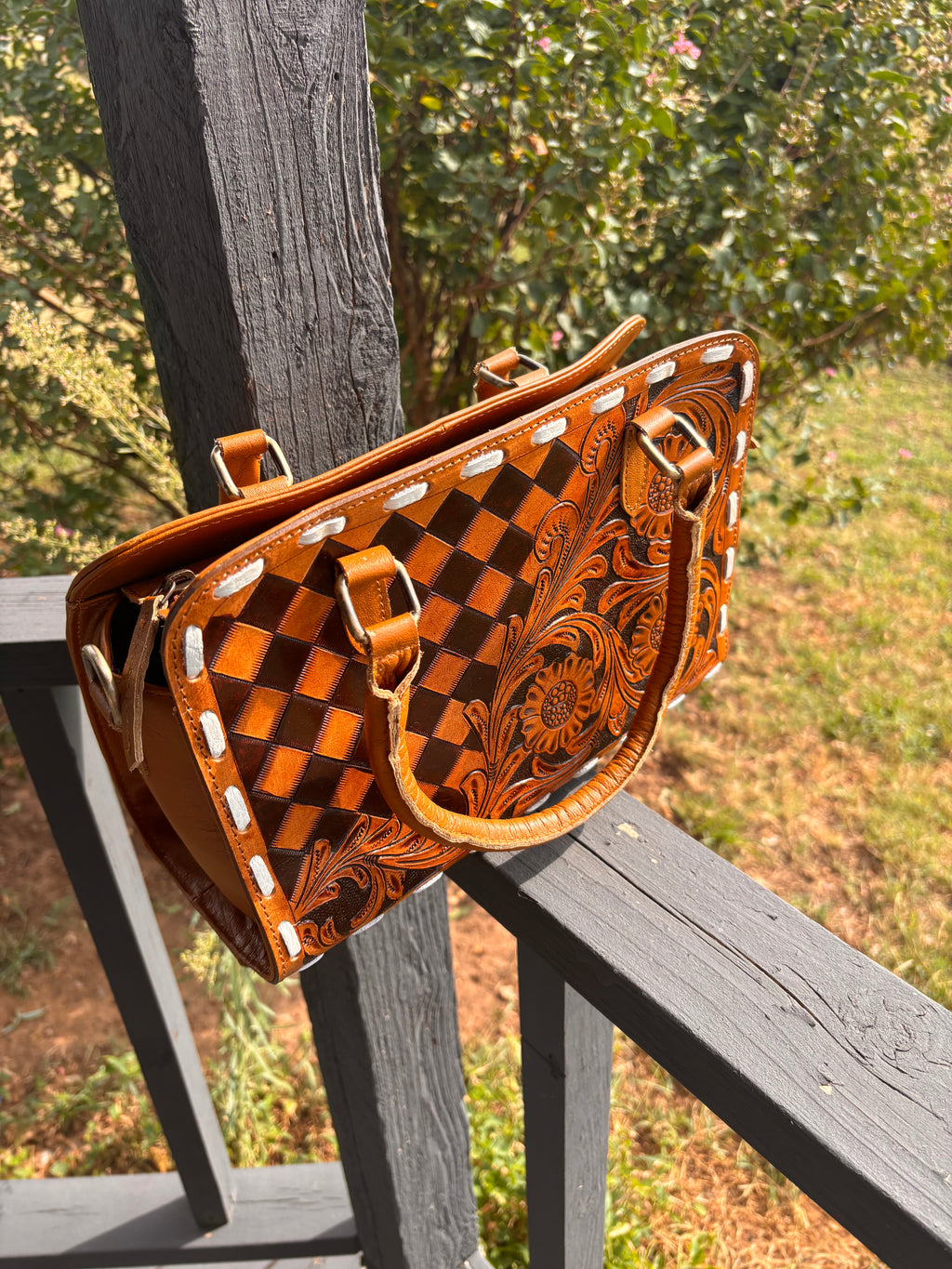 Checkered leather hand bag with matching wallet