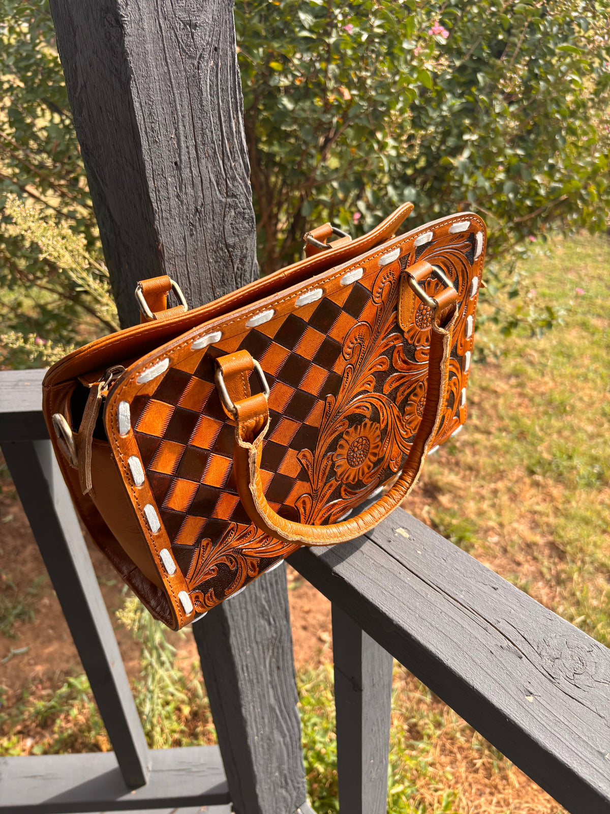 Checkered leather hand bag with matching wallet